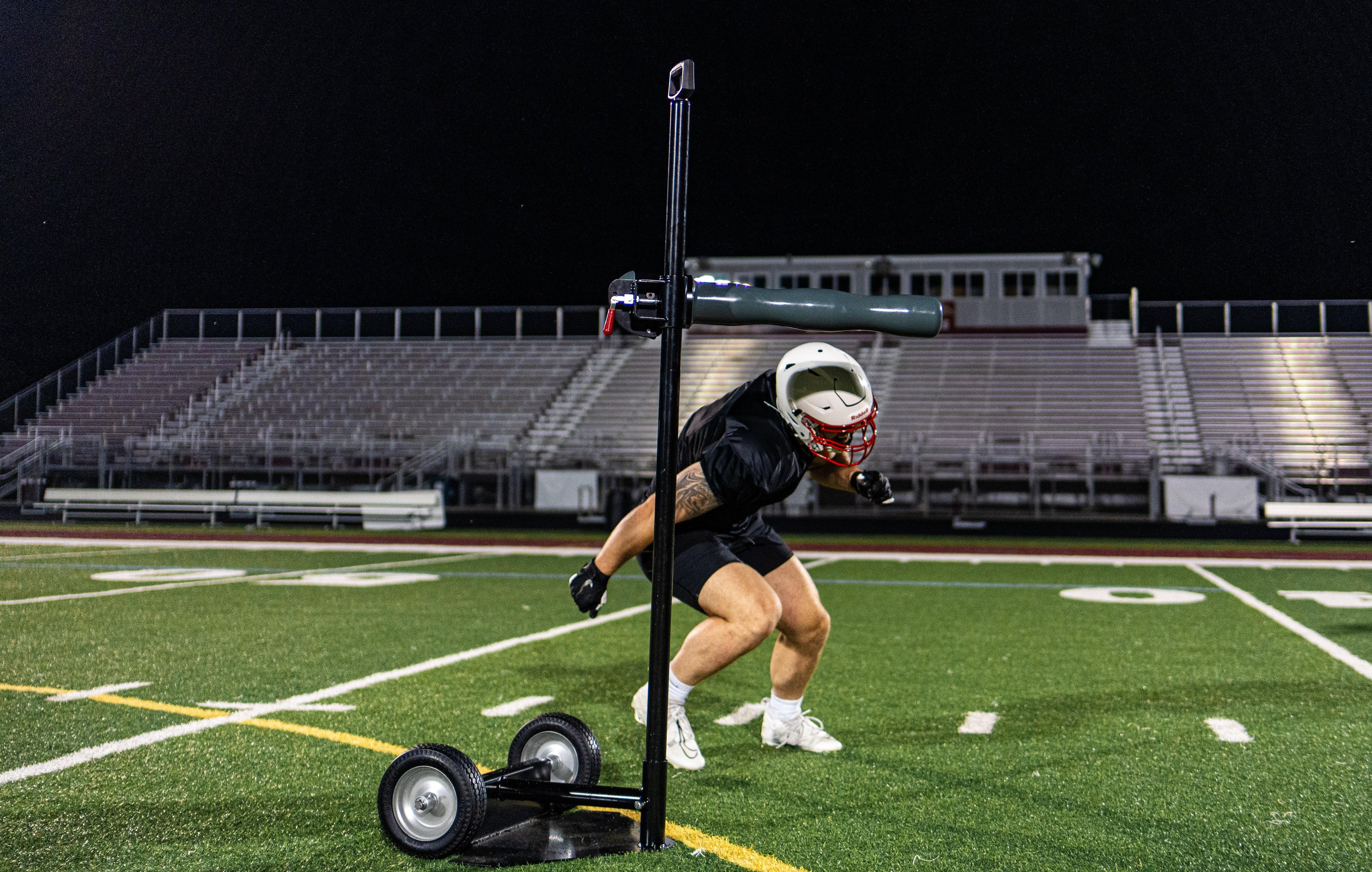 Football PLayer Using Half-Gate Football Training Equipment to Develop Proper Pad Level and Leverage